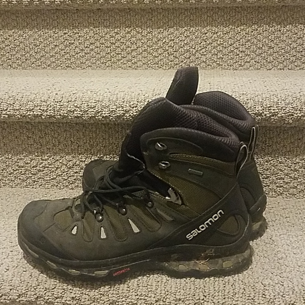 Dark green Salomon hiking boots